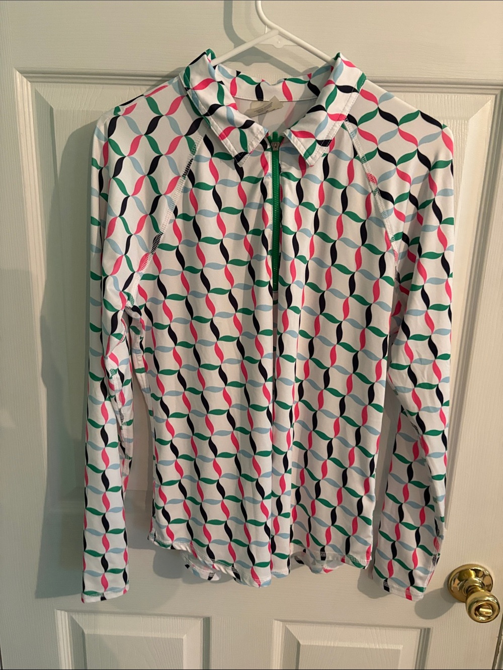 Jofit White Zip-Up Long Sleeve Golf Top with Pink, Green & Navy Geometric Print